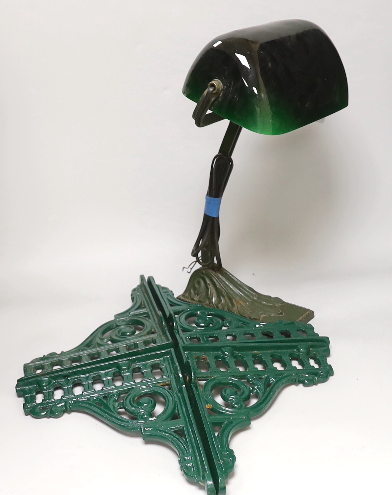 A student's lamp and four painted cast iron wall brackets